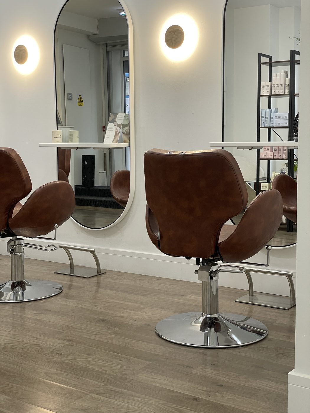 Styling stations with arched mirrors at Urban Hair & Beauty Salon, Chapel Street