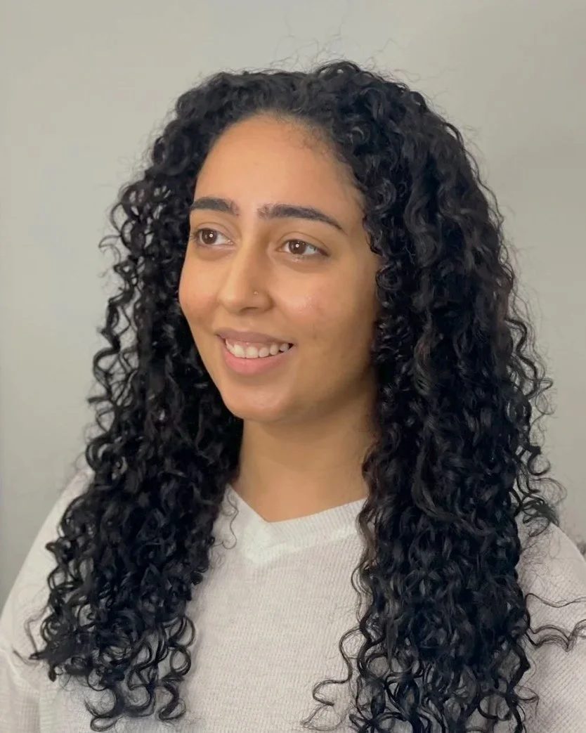 Defined curls after a curly cut and treatment